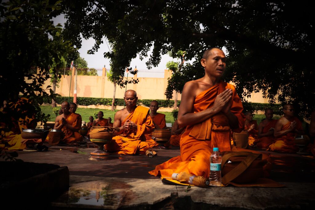 Monks performing a compassion meditation